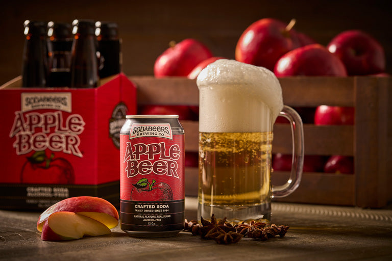 SodaBeer Apple Beer can and glass with apples in the background